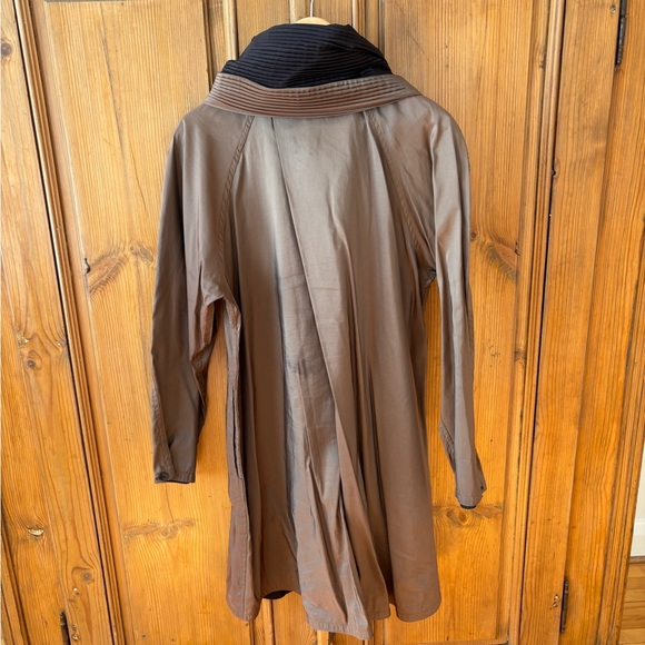 Brown with black lined rain shell. - Picture 2 of 3